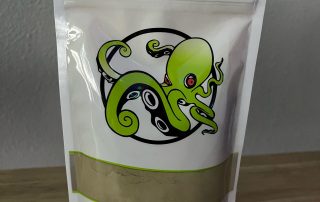 Photographic image depicting a packet of Kraken Kratom OG Bali Kratom Powder